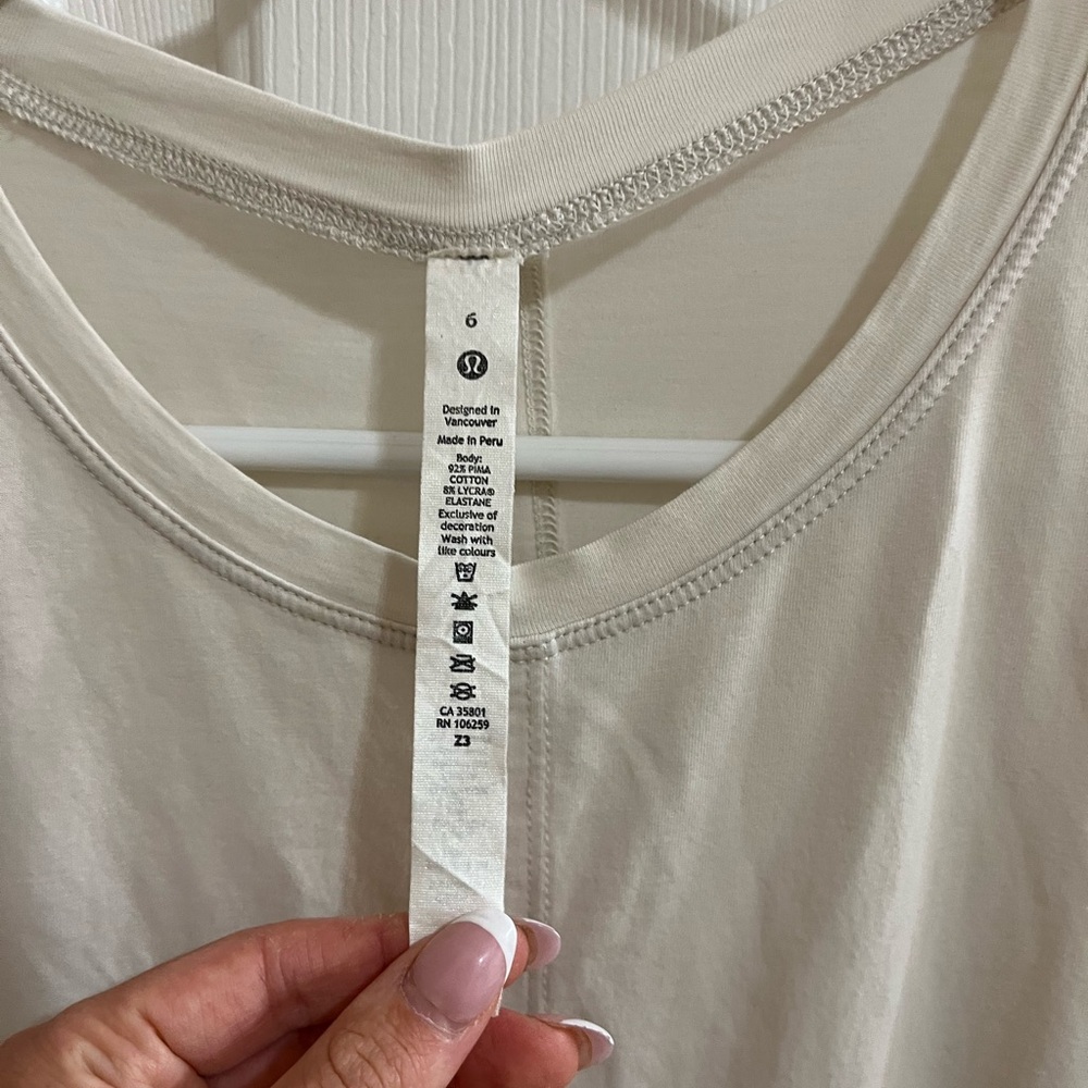 Women’s Lululemon Short Sleeve Shirt with Tie Wrap Size 6 - Picture 3 of 8